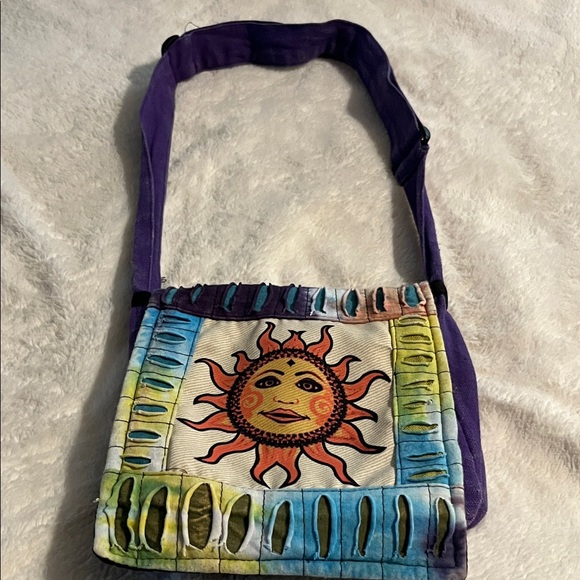 Rising International Handbags - Rising International Purple Canvas Crossbody with Sun Motif